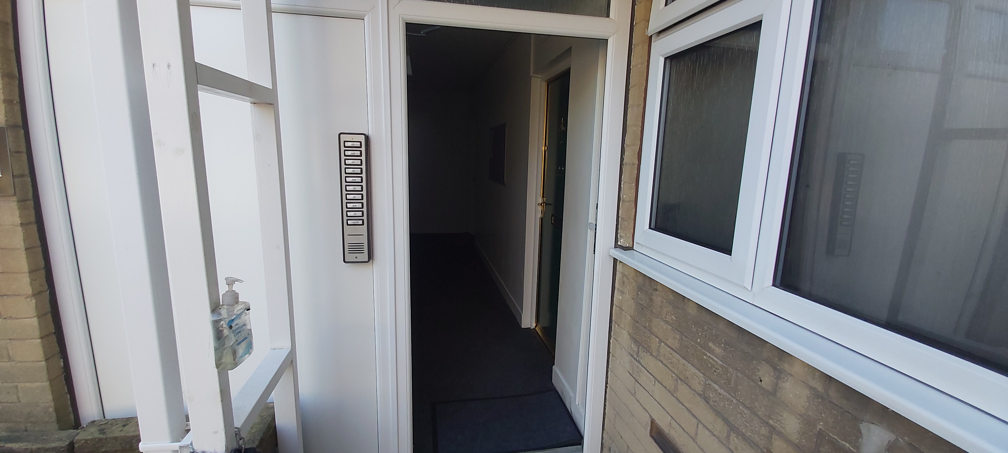 Secure entrance door to the apartment block